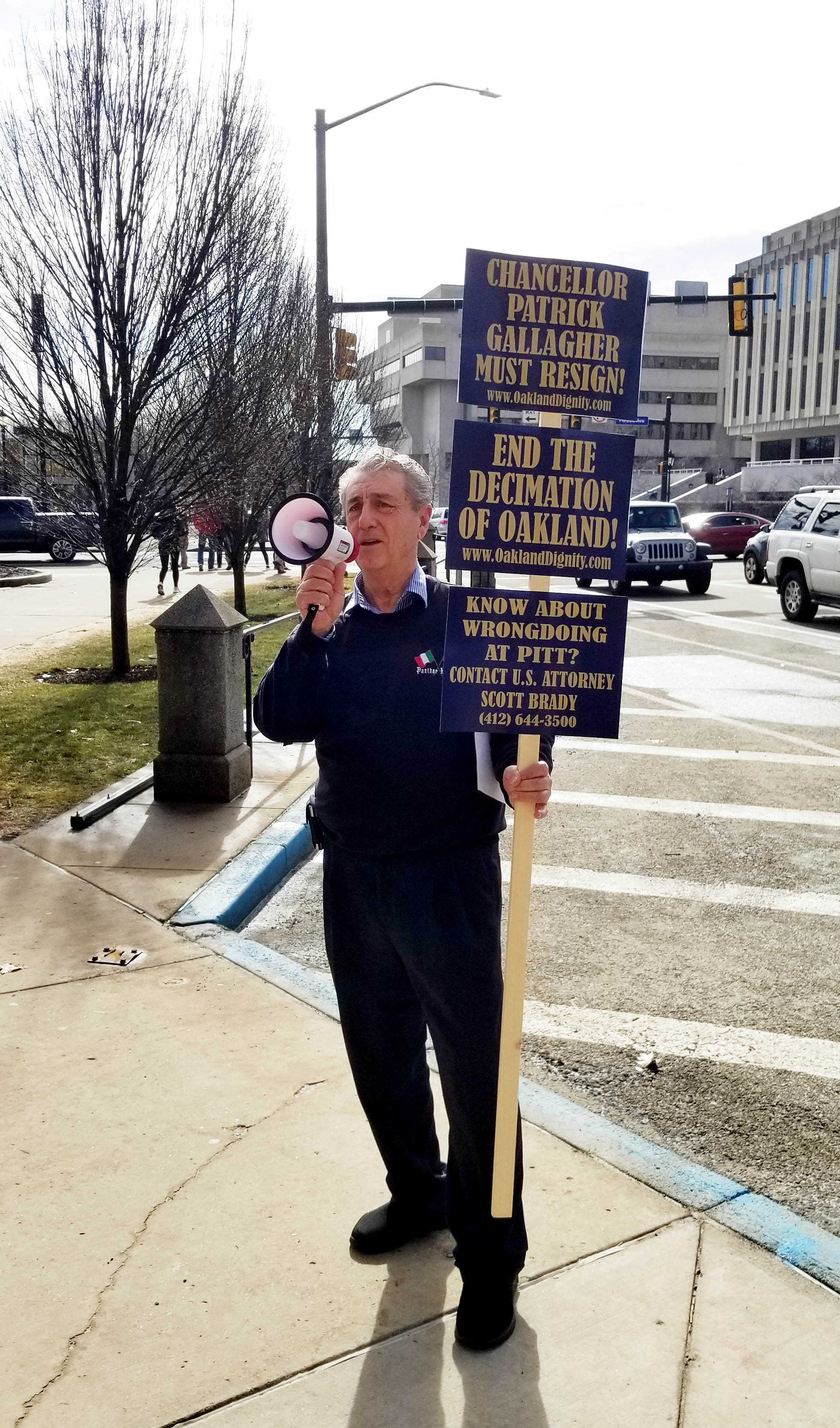 Carlino Giampolo with signs